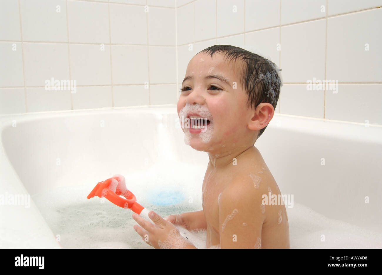 Toddler taking a bath Stock Photo Alamy