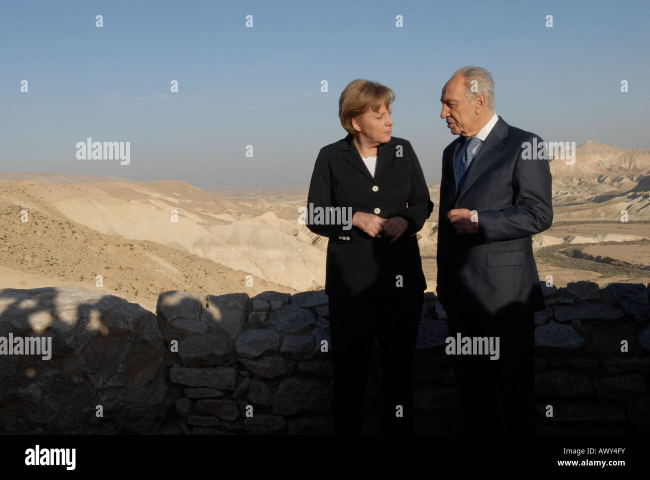 German chancellor Angela Merkel with Israeli president Shimon Peres in the Negev desert, Israel Stock Photo