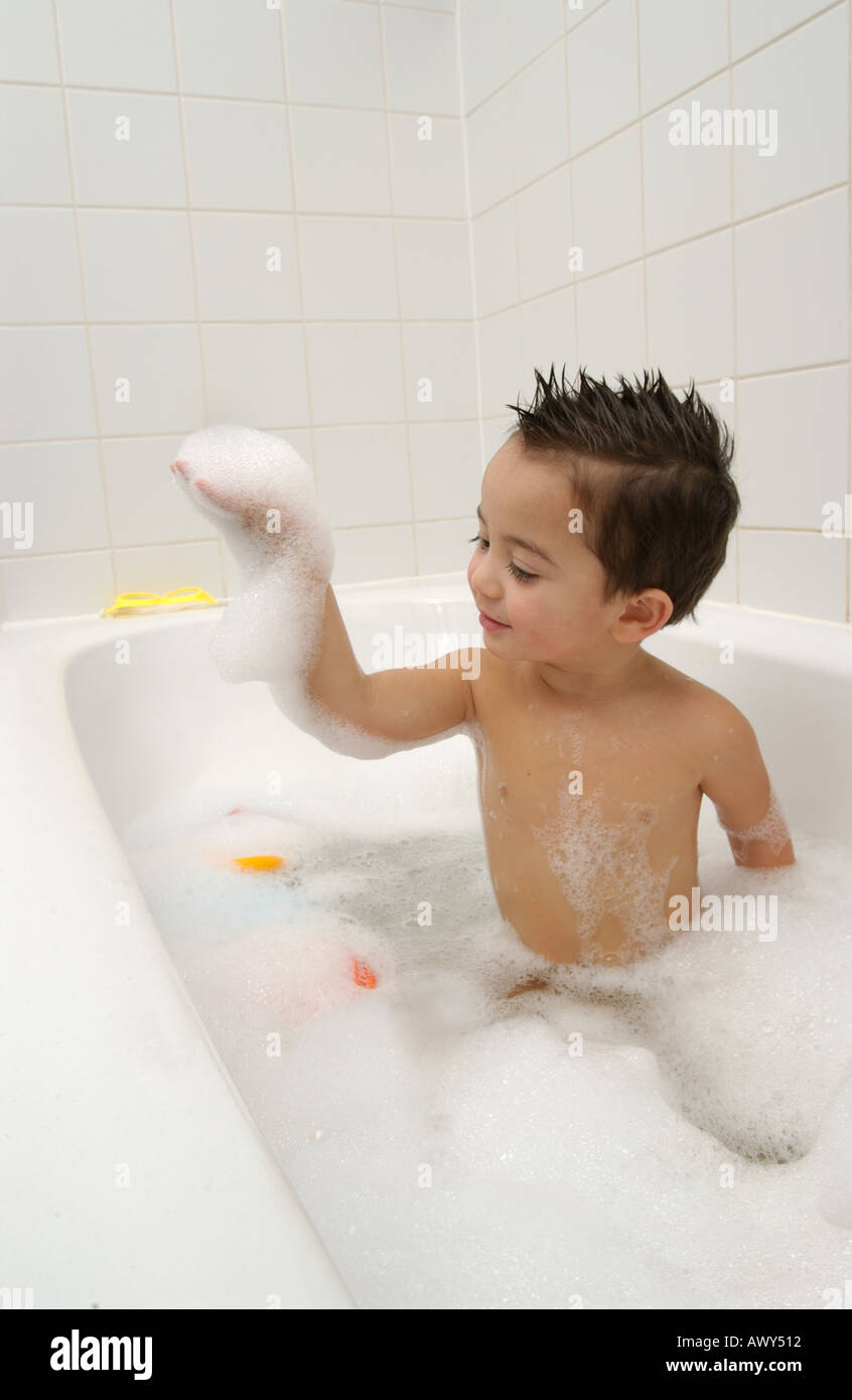 Toddler taking a bath Stock Photo Alamy