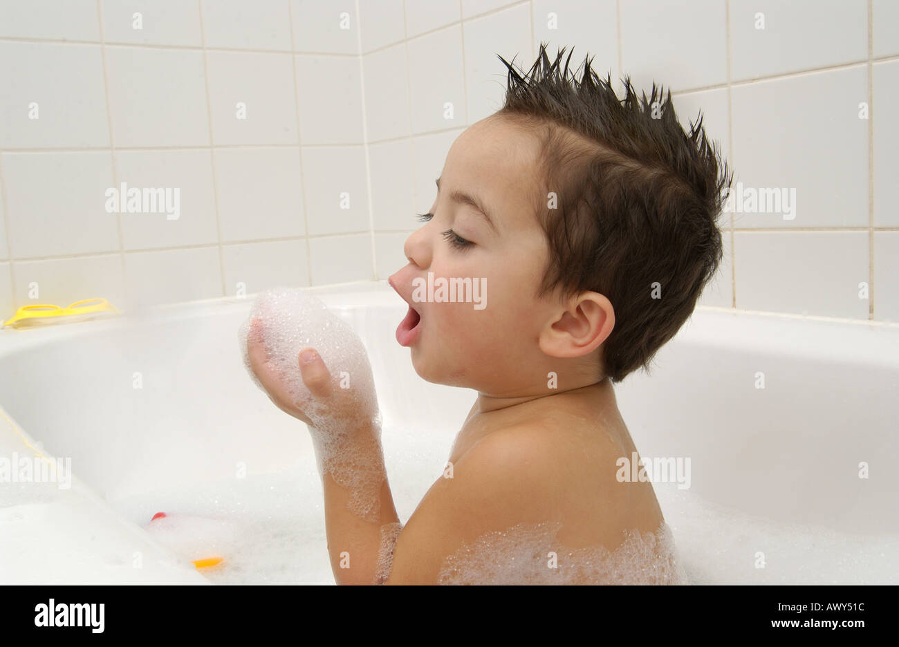 Toddler taking a bath Stock Photo Alamy