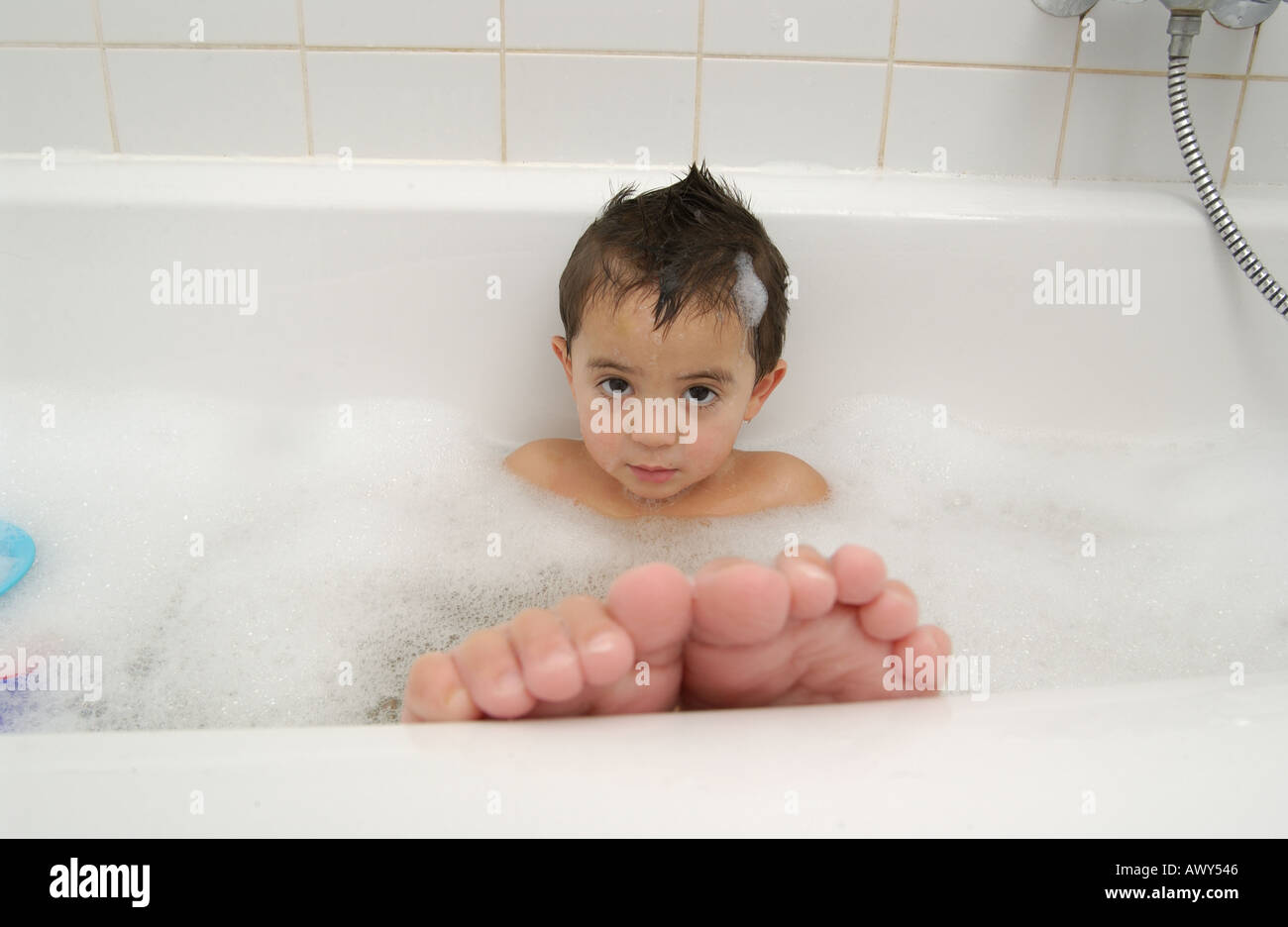 Toddler taking a bath Stock Photo Alamy