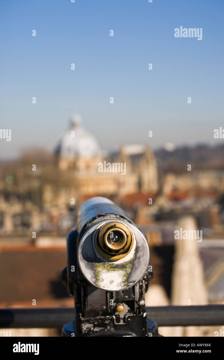 Coin operated telescope with view of out of focus Oxford skyline