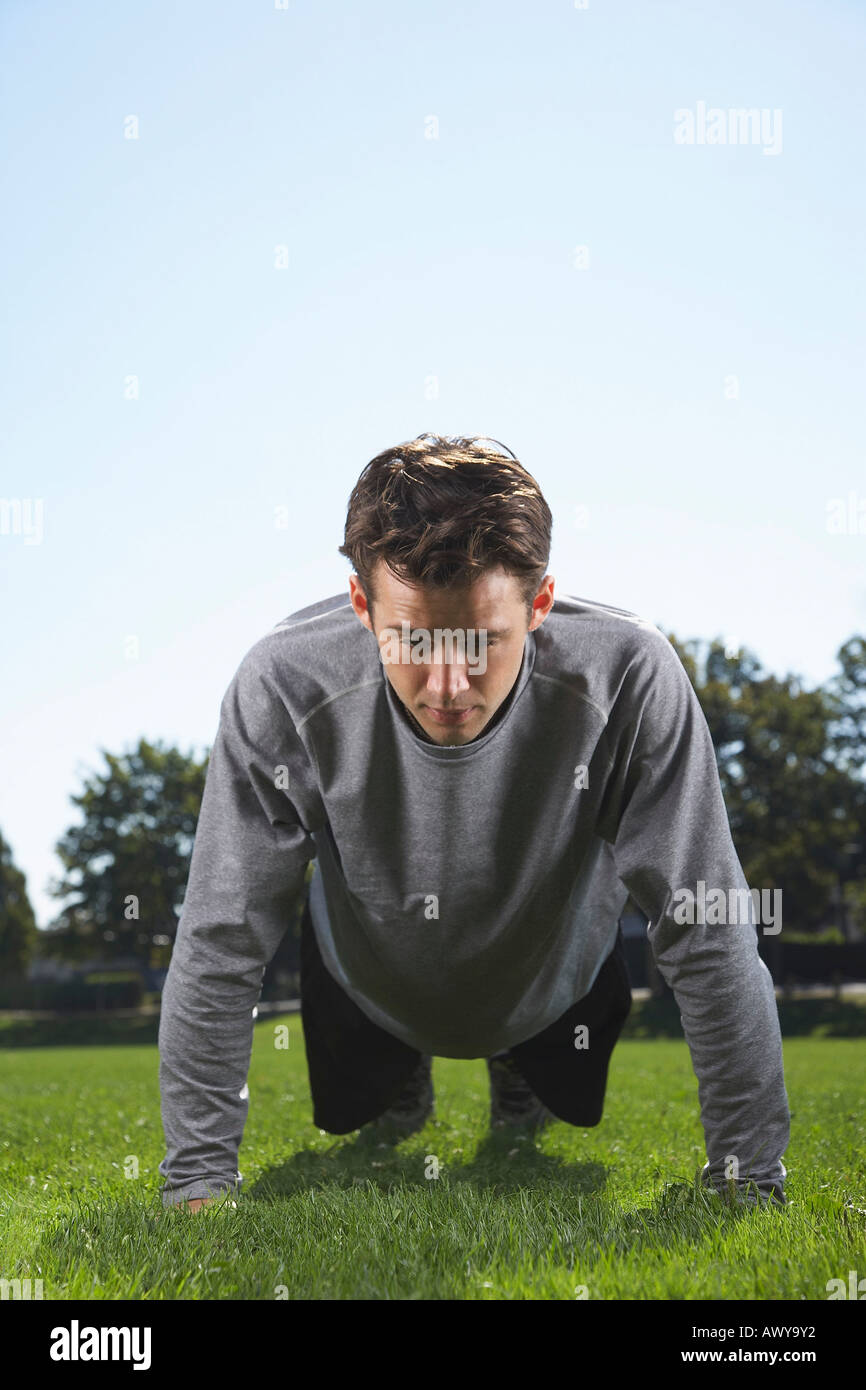 Man Doing Push Ups Stock Photo
