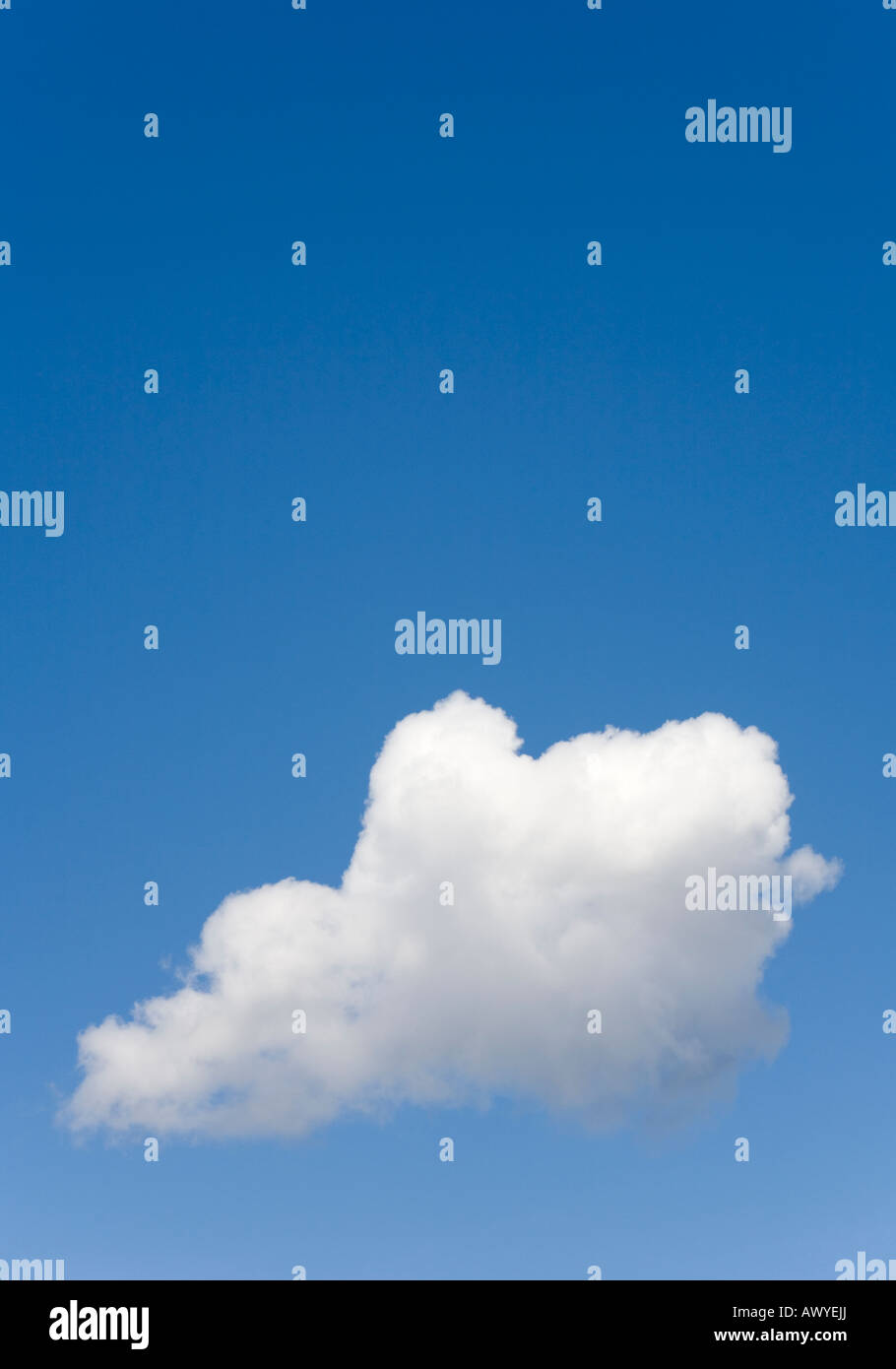 Single white cloud on blue sky , Finland Stock Photo