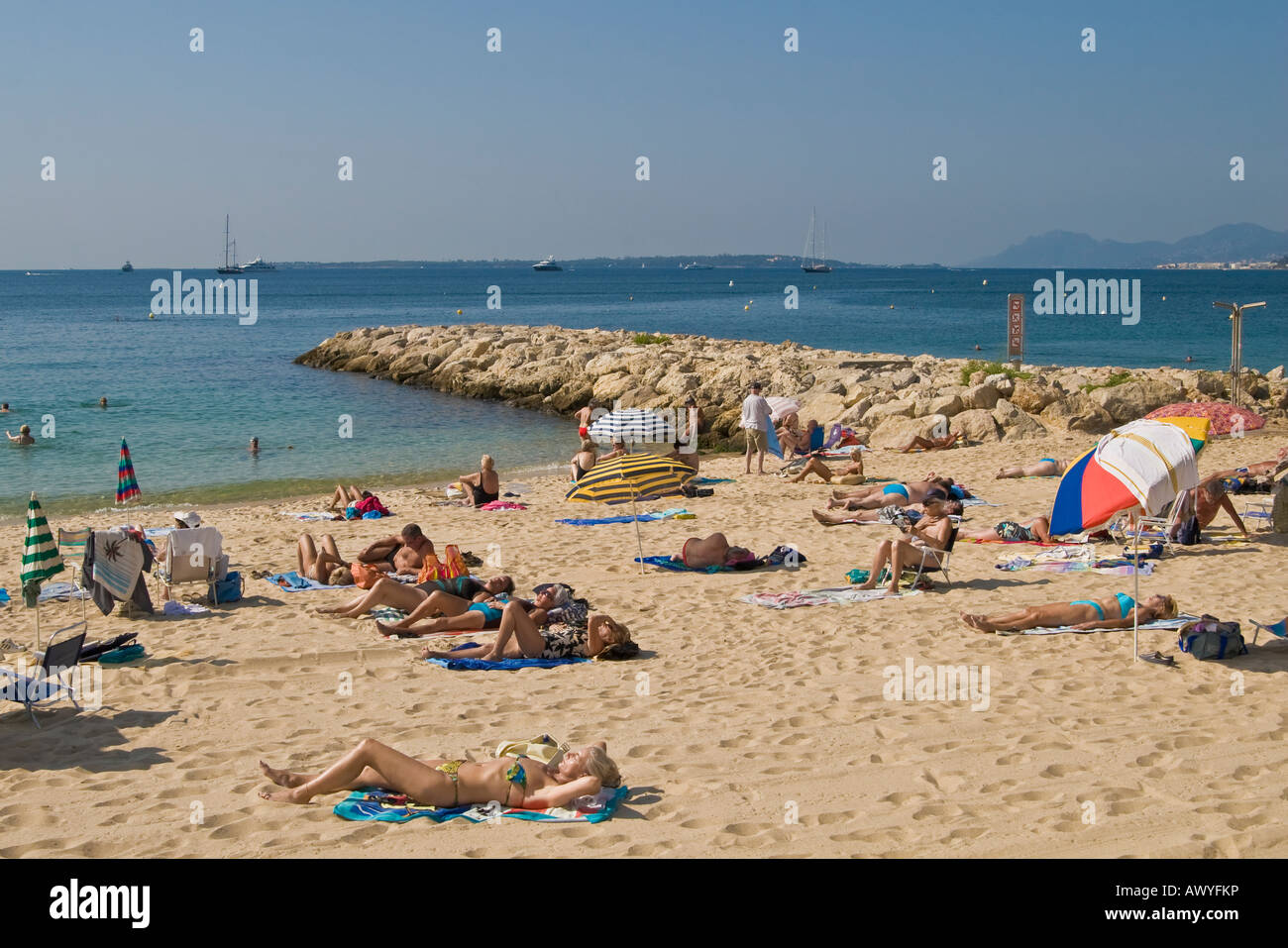 People on sandy beach of Juan les Pins Stock Photo