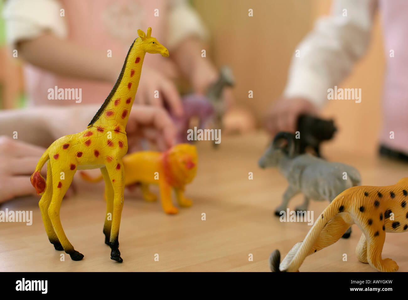 Children playing with toyanimals Stock Photo Alamy