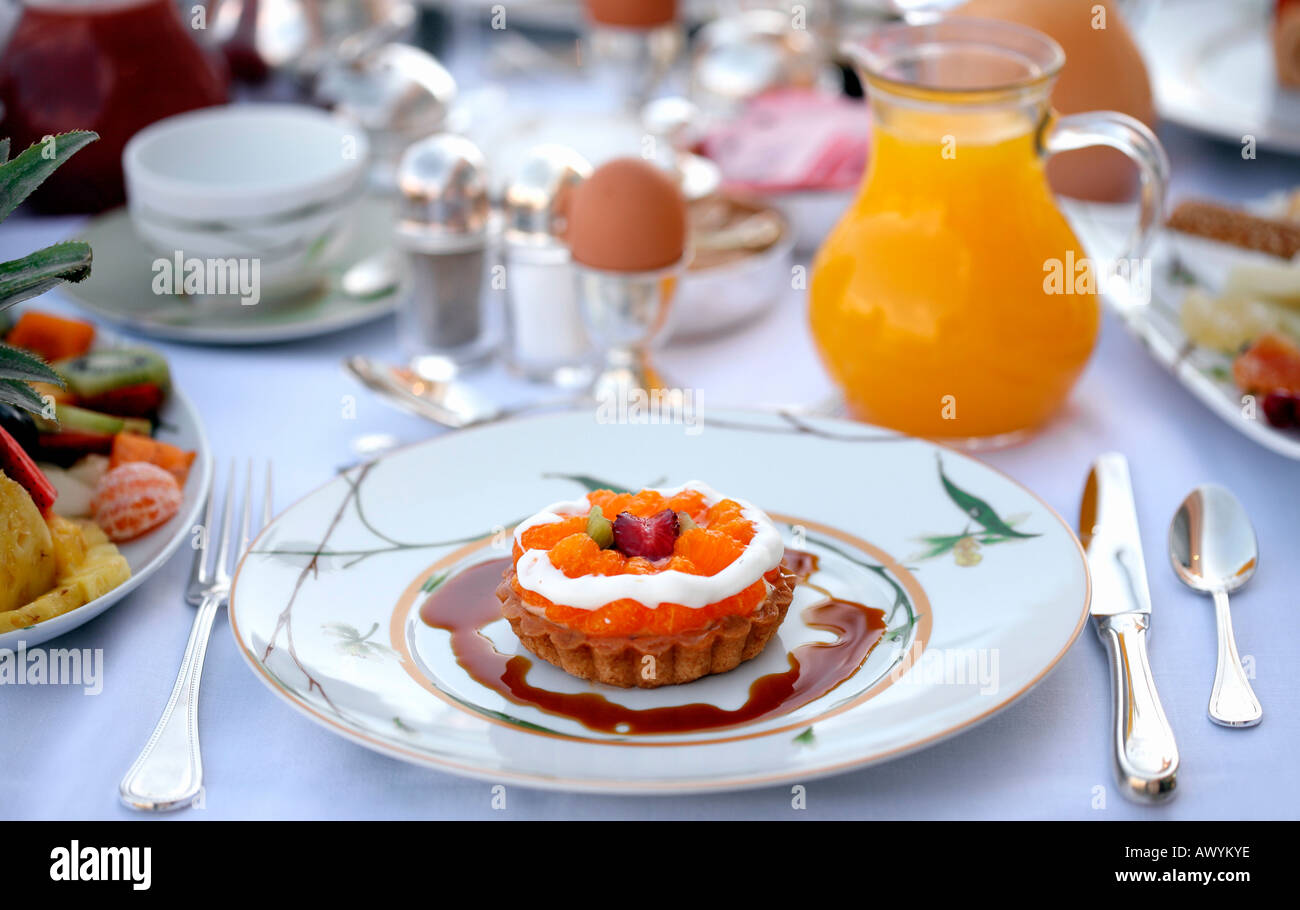 Breakfast table with sweet tart Stock Photo