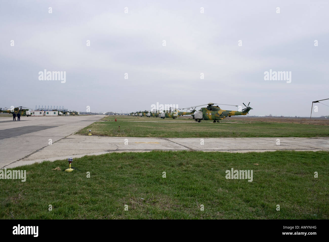 military helicopters parked near the runway Stock Photo