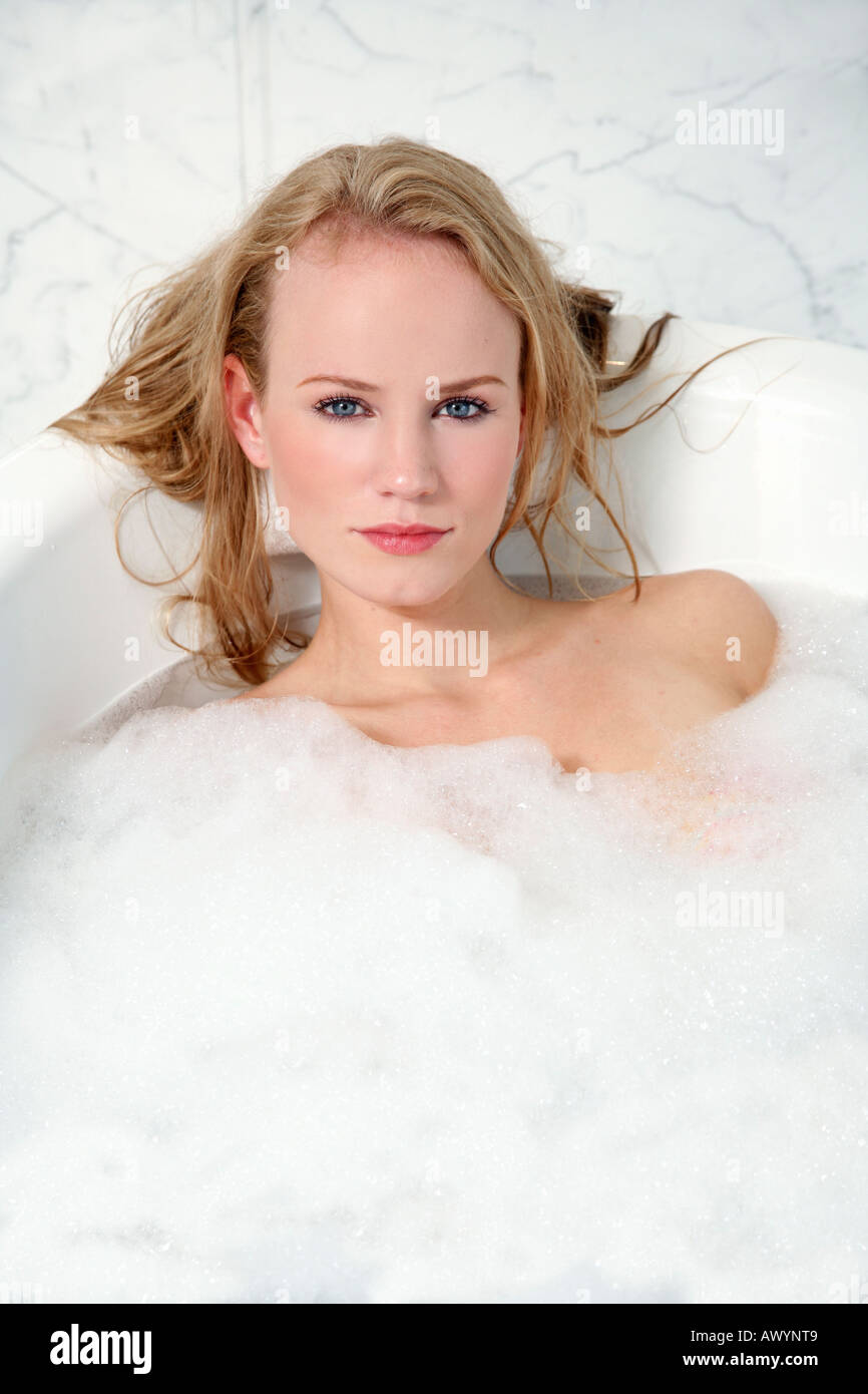 Woman enjoying bubble bath Stock Photo - Alamy