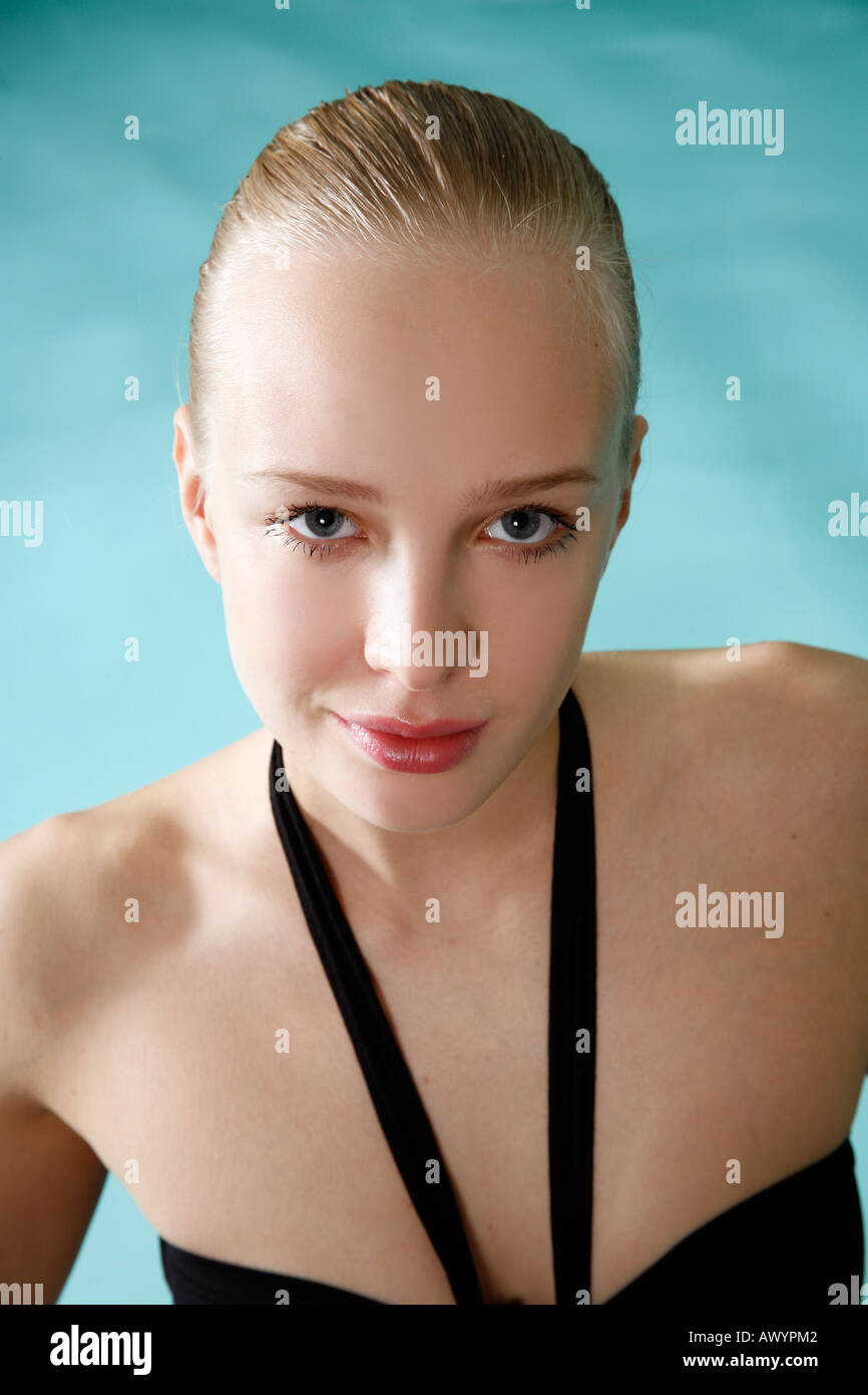 Young woman in a swimming pool at a spa Stock Photo