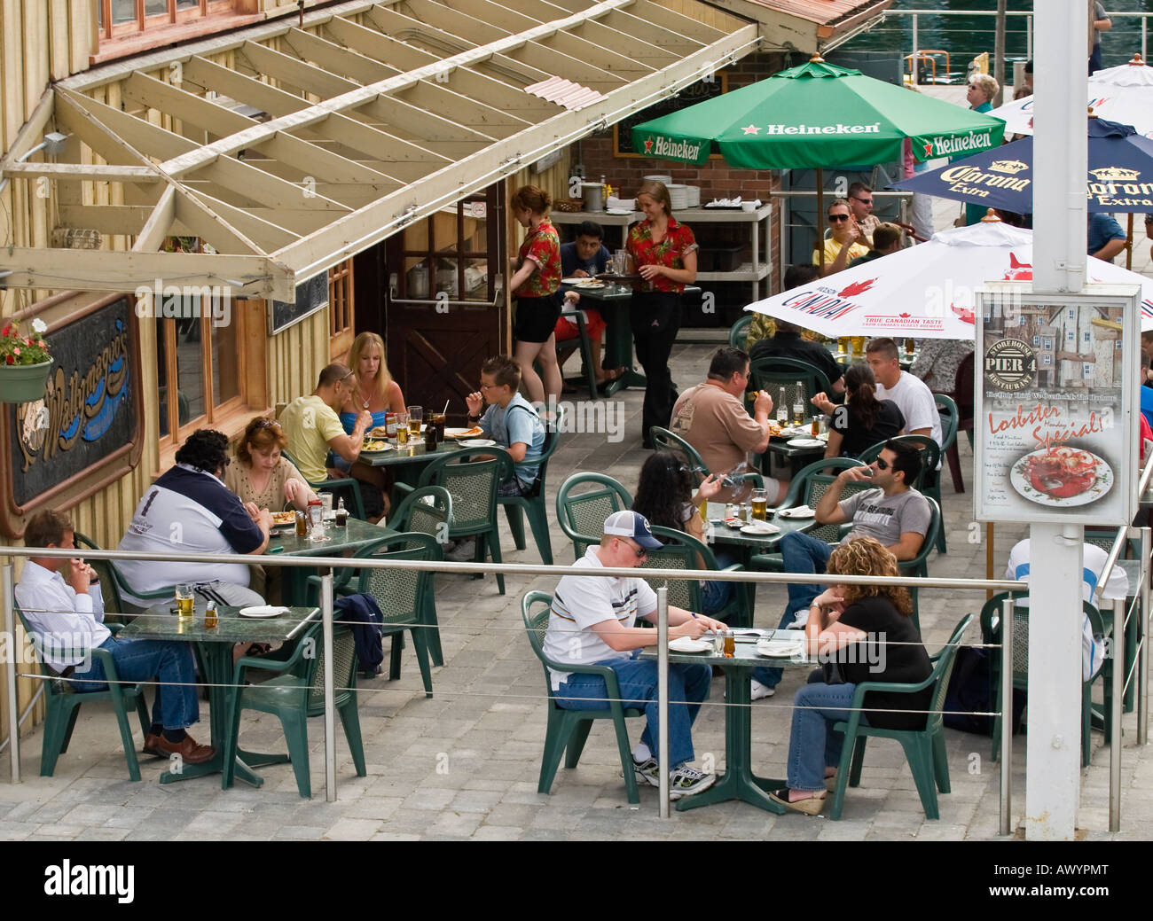 People dining at the Wallymagoo's restaurant patio, Toronto