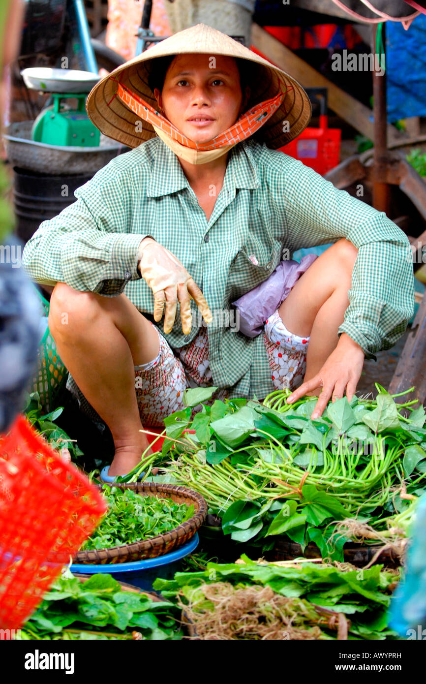 Asia Far East Vietnam Hoi An market pretty young farm lady in non bai