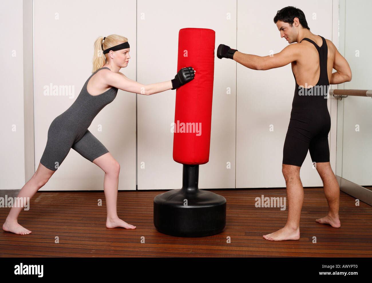 Man practicing karate punching bag hi-res stock photography and images -  Alamy