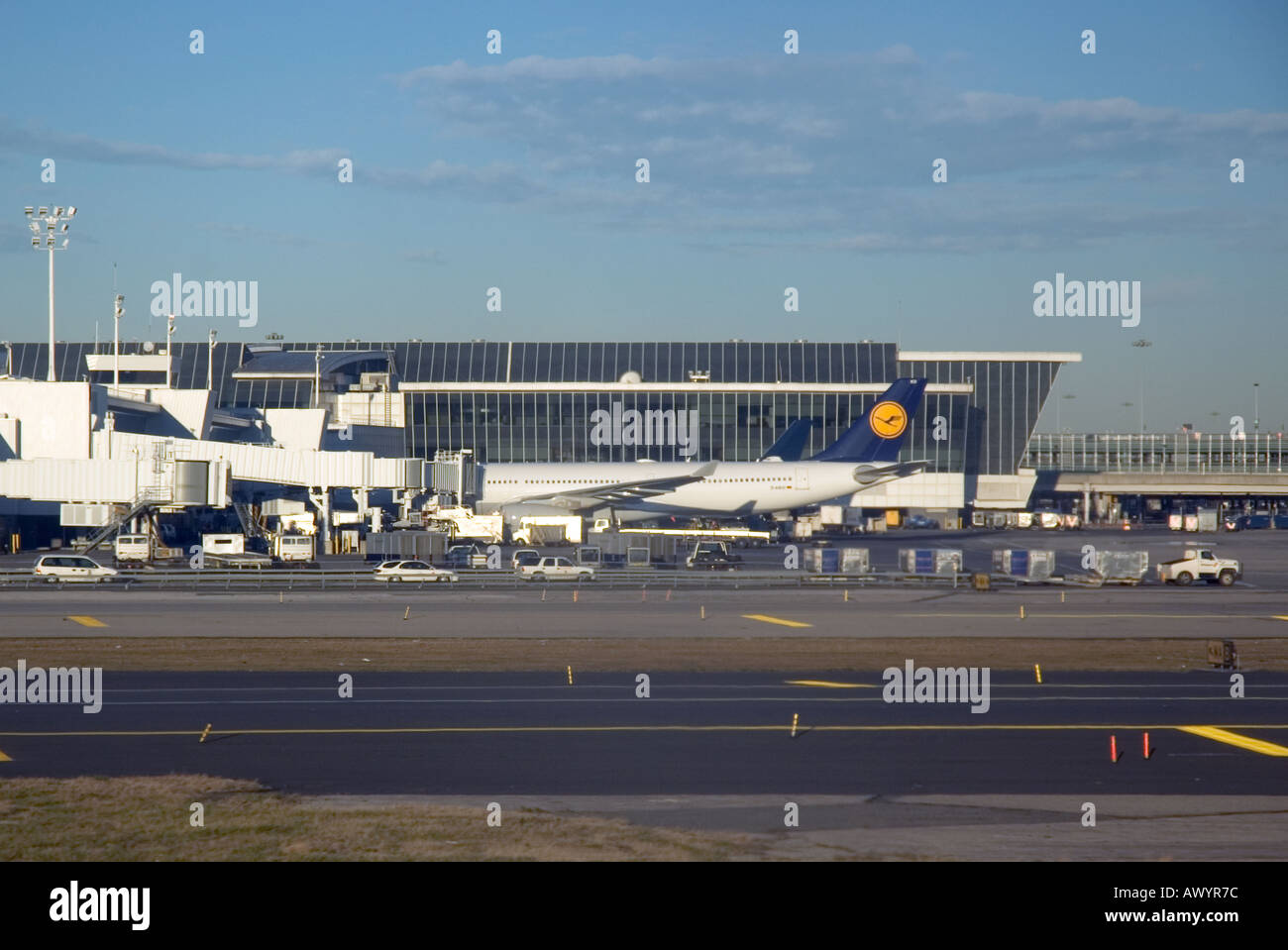 A Lufthansa jet is parked at the gate in JFK Airport in New York Stock Photo
