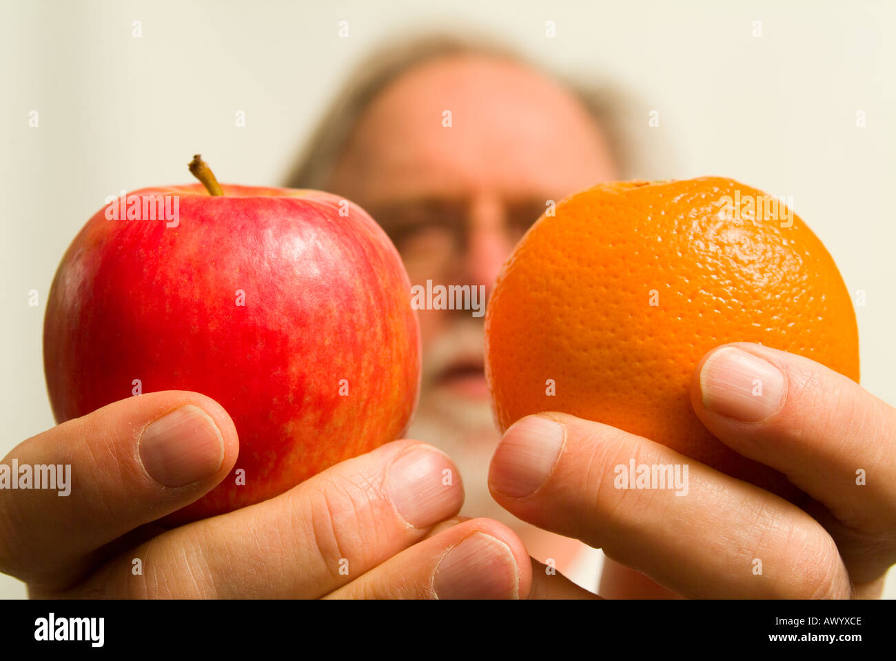 Comparing apples with oranges Stock Photo Alamy