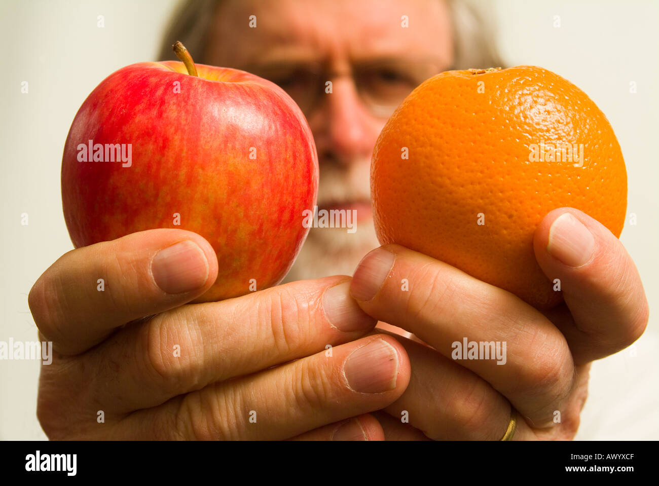 Comparing apples with oranges Stock Photo Alamy