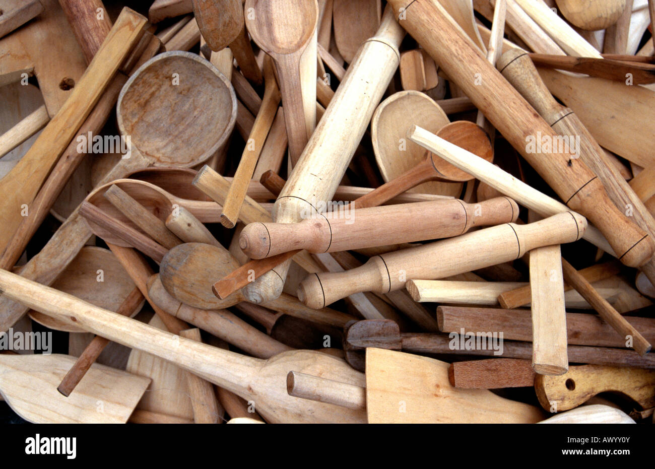Wooden cooking spoons on display in street market Stock Photo Alamy