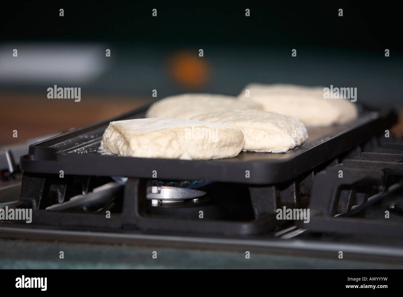 traditional irish soda bread baking on a modern gas hob cooker on a