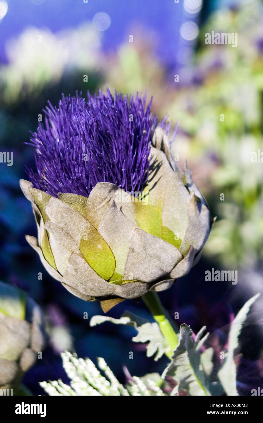 An artificial decorative cloth thistle on a street vendors stall in Edinburgh Stock Photo