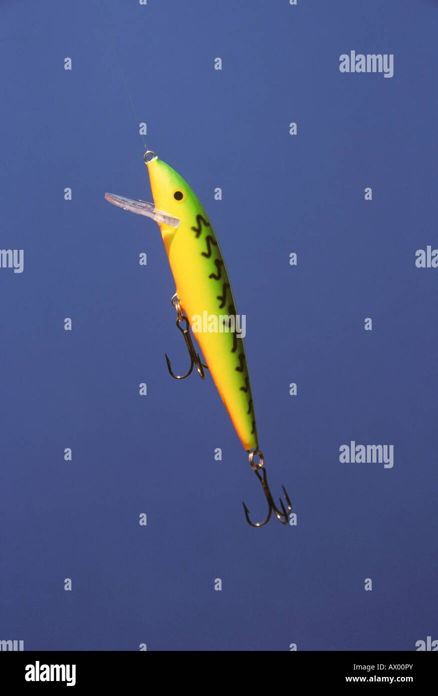 Yellow and green fishing lure Stock Photo Alamy