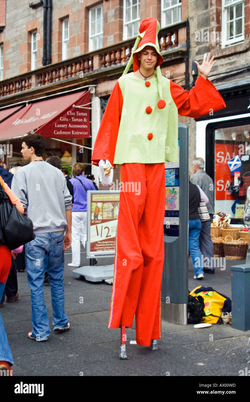 A man walking on stilts at the Edinburgh festival fringe Royal mile, Scotland. Stock Photo