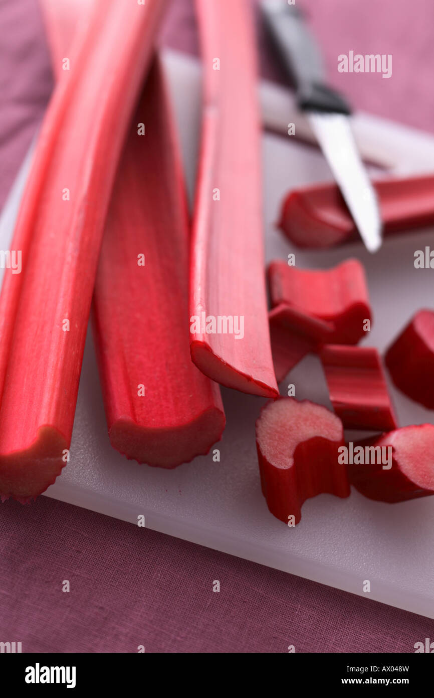Cutting rhubarb Stock Photo