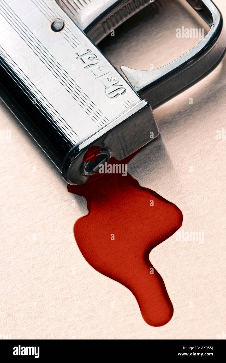 blood oozing out of a pistol nozzle Stock Photo