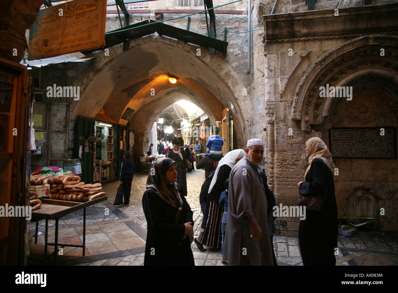 Shoppers browse at a market in the old city section of Jerusalem Stock Photo