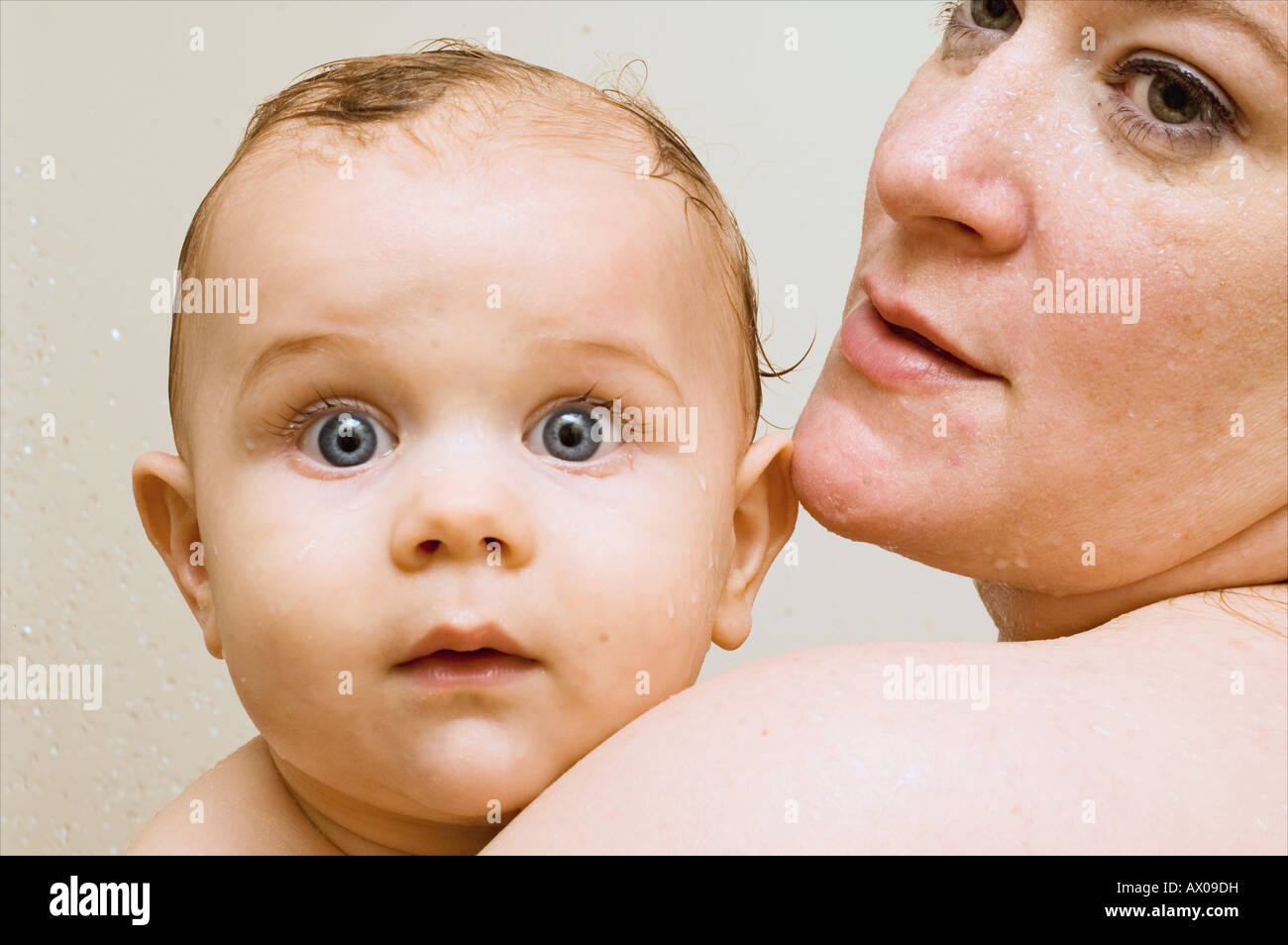 Baby Takes shower Stock Photo Alamy