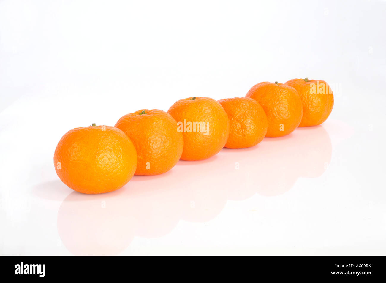 Clementines in a row Stock Photo