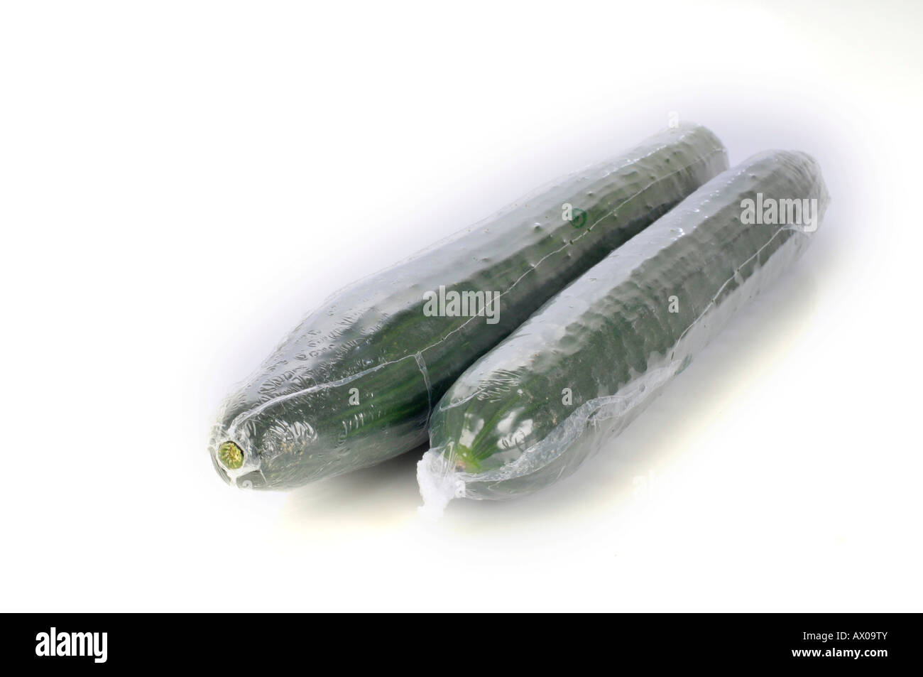 Cucumbers in plastic wrap Stock Photo