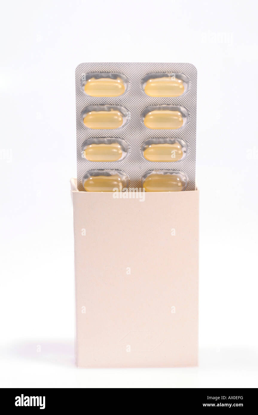 Pills in a neutral blister pack and unmarked package Stock Photo