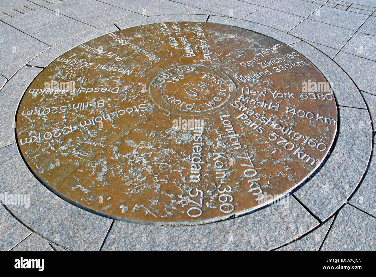 On the cathedrale square distances to other cities are shown on a copper plate, Ulm, Baden-Wuerttemberg, Germany Stock Photo