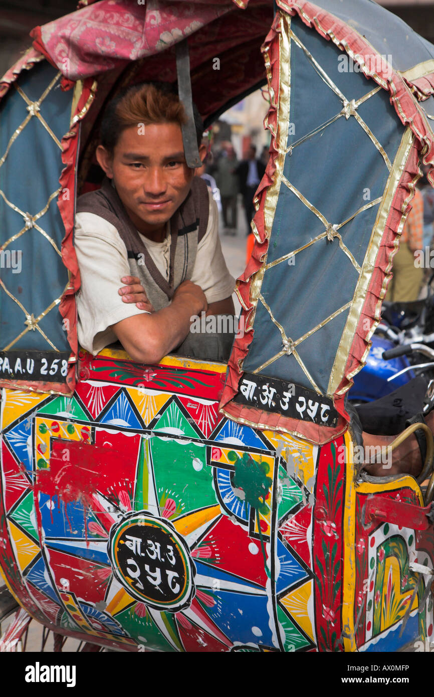 Nepal, Kathmandu, Hanuman-Dhoka Durbar Square, (UNESCO World Heritage Site), Rickshaw driver Stock Photo
