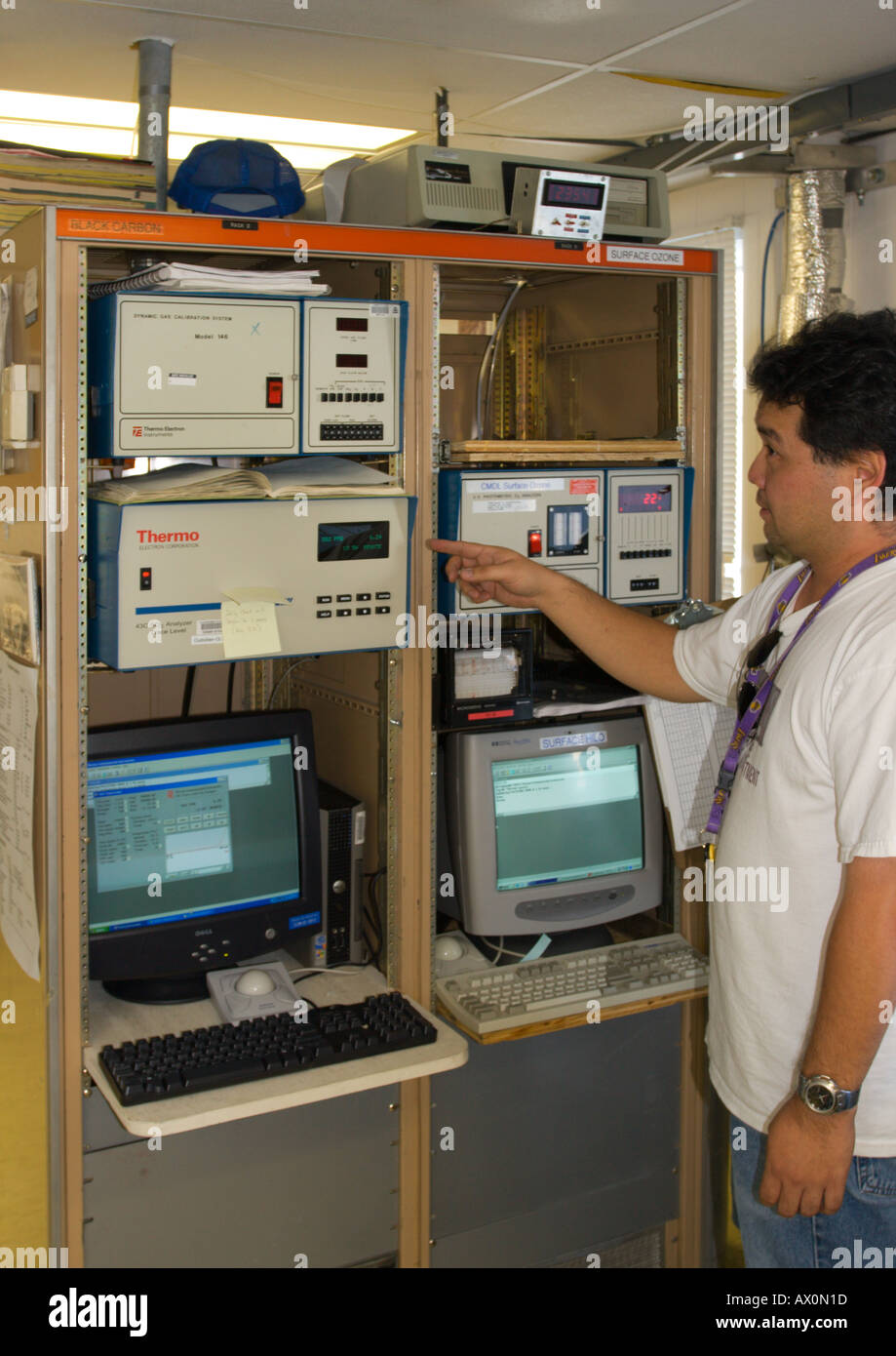 Technician with equipment at the NOAA Earth System Research Laboratory
