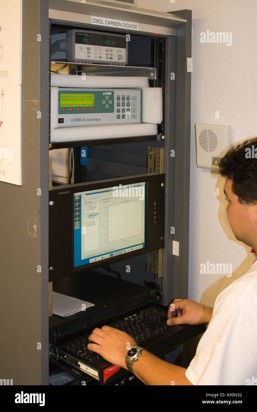 Technician with equipment at the NOAA Earth System Research Laboratory