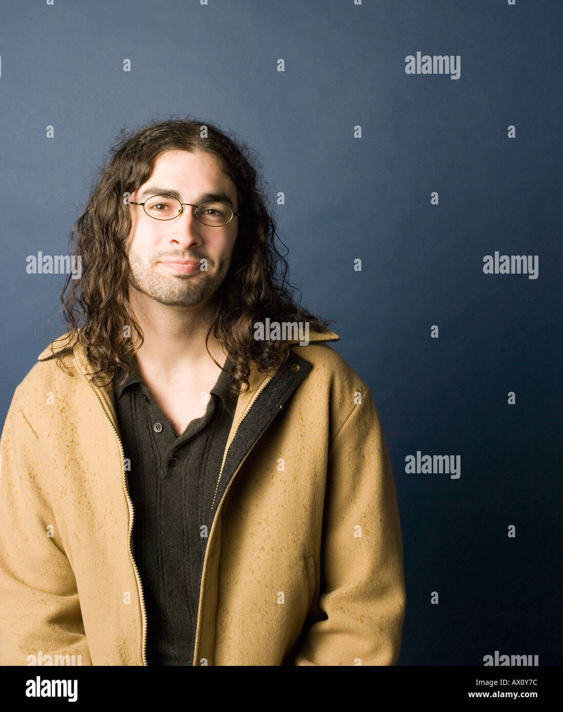 Portrait Caucasian man with long hair Stock Photo