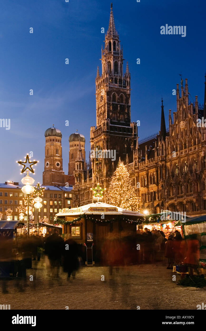 Christmas market on Marien-Place Munich with townhall and cathedral, Bavaria, Germany Stock Photo