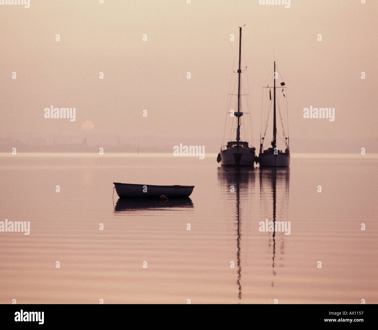 Silhouetted yachts at anchor hi-res stock photography and images - Alamy