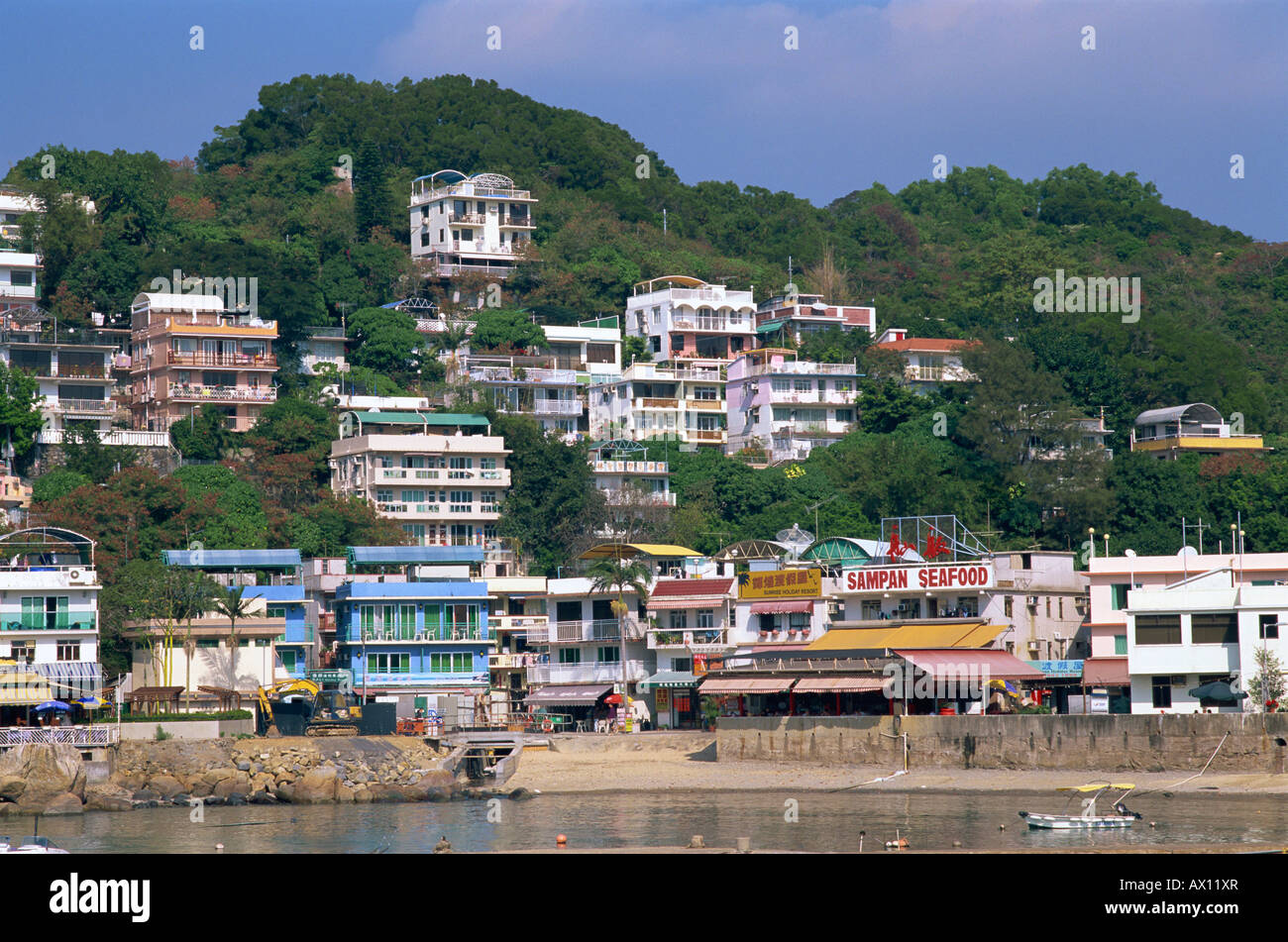 China, Hong Kong, Lamma Island, Harbourfront View of Yung Shue Wong Village Stock Photo