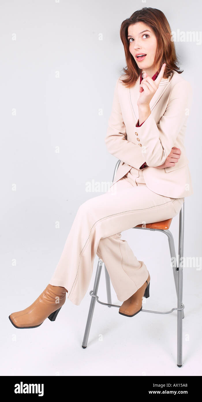 Businesswoman sitting stool hi-res stock photography and images - Alamy