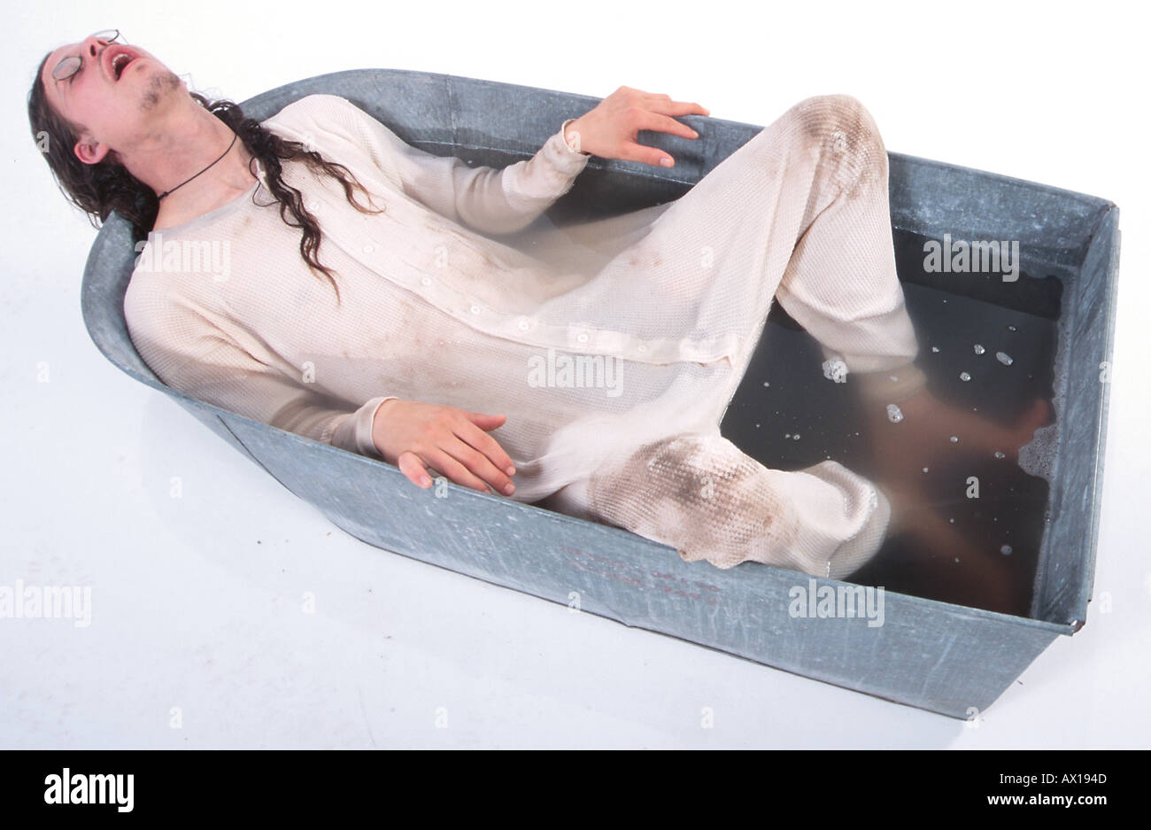 Man sleeping in bath tub hires stock photography and images Alamy