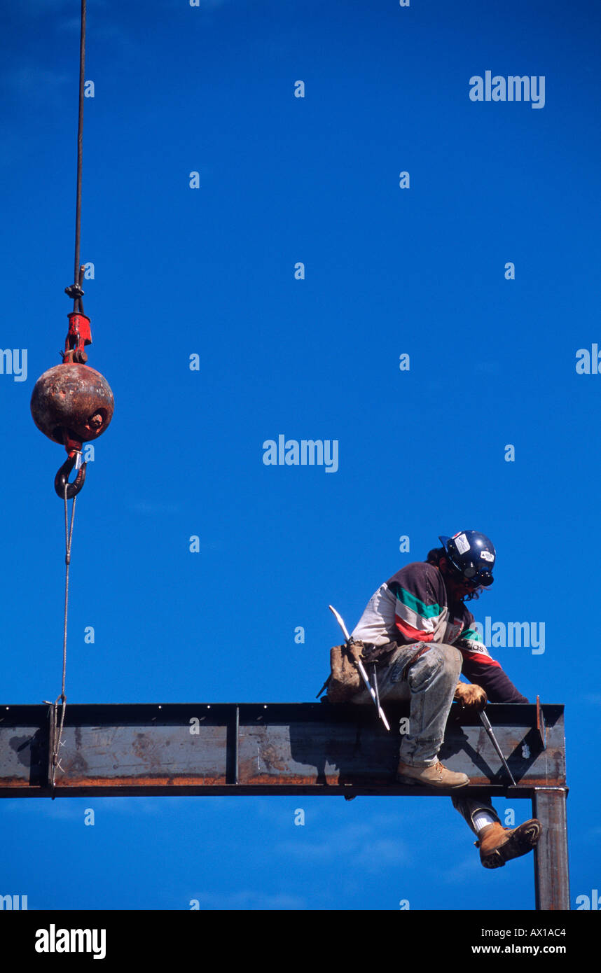 construction worker on steel girder or beam Stock Photo - Alamy