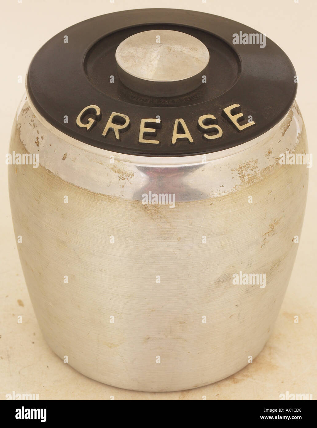 Black and metal grease jar L3 Stock Photo Alamy