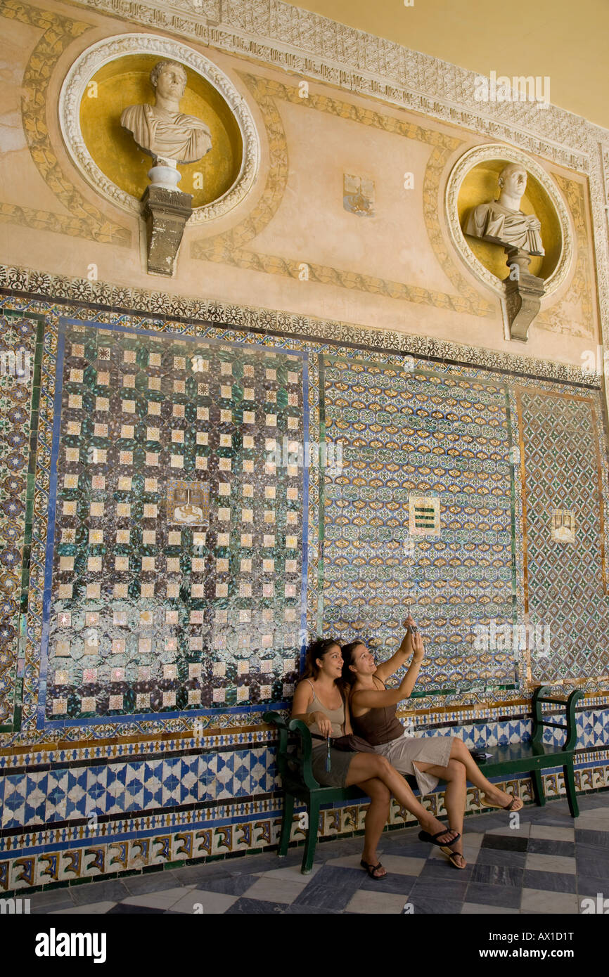 Tourists, girls, Casa de Pilatos, Casa Ducal de Medinaceli, courtyard, tiles, Patio, Palace House, Pation, Sevilla, Andalucia,  Stock Photo