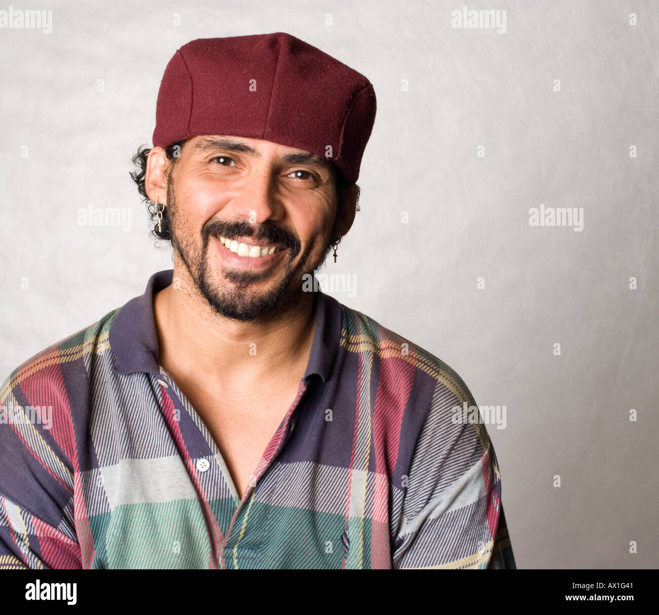 Portrait of a happy Latino man Stock Photo - Alamy