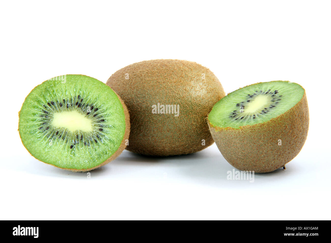 kiwi and two half isolated on white background healthy eating and agriculture concepts Stock Photo