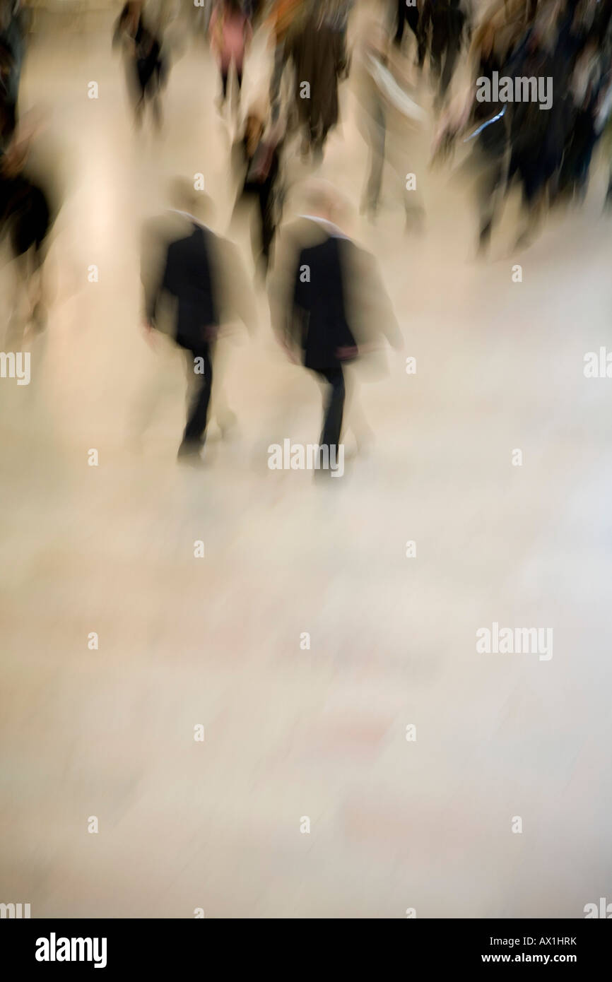 Blurred view of people walking Stock Photo - Alamy