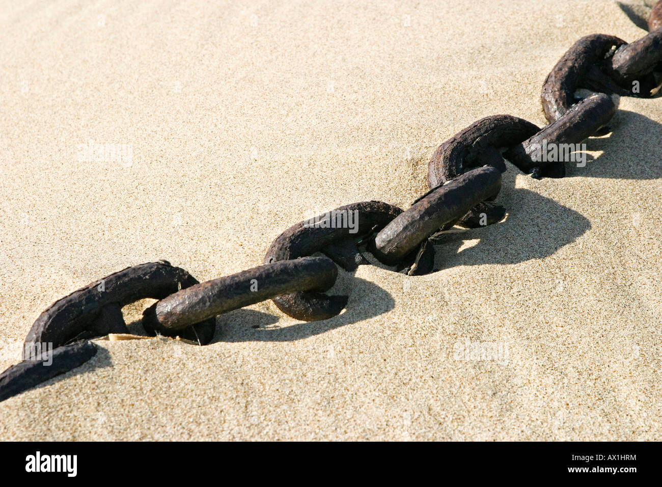 Old strong rusted chain cable from the detonated 'United Traider', diamond prohibited area, Saddlehill, Namibia, Africa Stock Photo