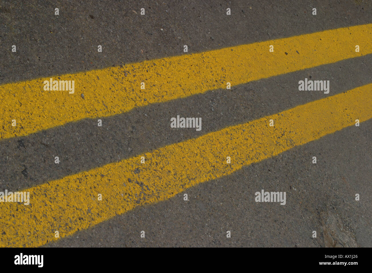 Double yellow lines road markings no parking zone Stock Photo - Alamy